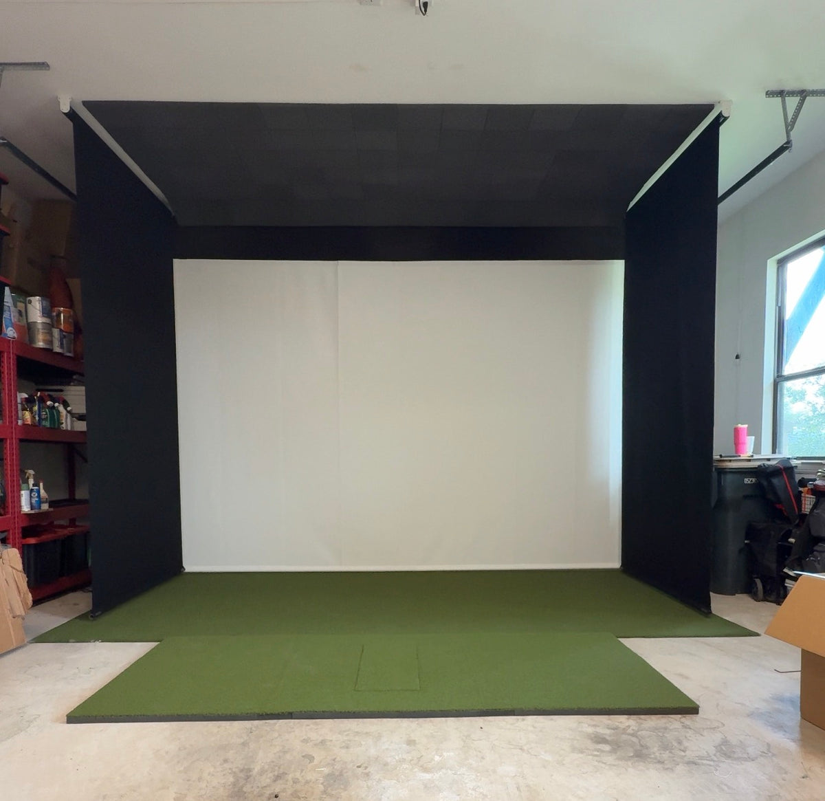 Retractable golf simulator build by Gungho Golf